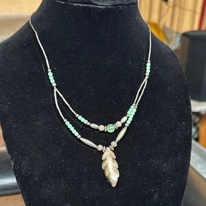 Elegant Silver and Green Leaf Pendant Necklace